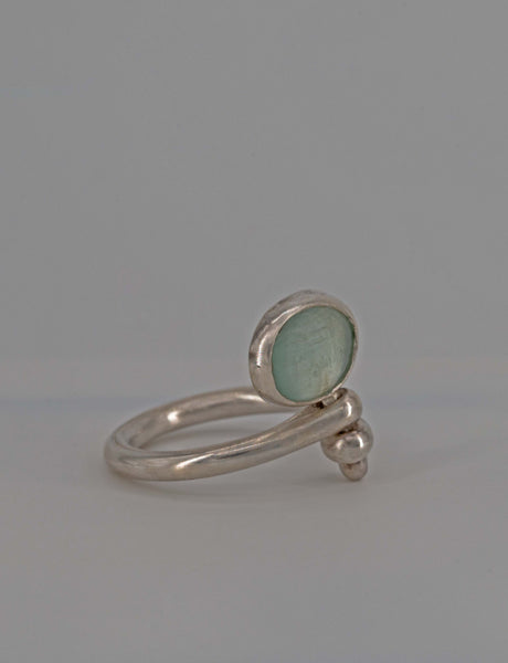 A kiss is just a KXXX- aquamarine mirror ring